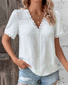 Blouse en dentelle légère pour femme - élégante blouse blanche à manches courtes pour un style décontracté