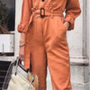 Salopette femme au style décontracté - combinaison utilitaire orange à manches longues et taille ceinturée