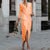 Robe midi élégante à enrouler orange - pour vos occasions spéciales