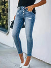 Jean skinny taille haute - un denim chic avec détails à boutons