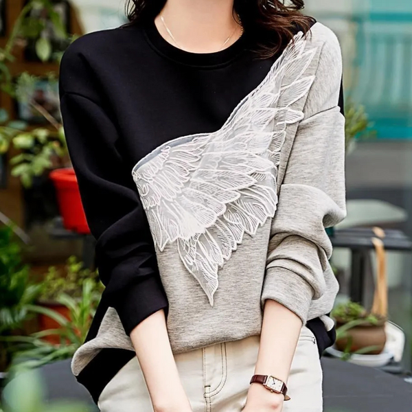 Sweatshirt noir premium - pull chic pour dames avec détails ailes