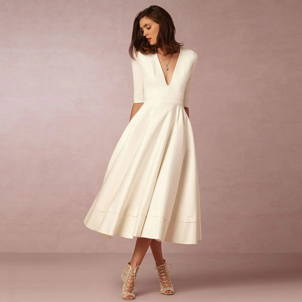 Robe midi décontractée pour femmes - élégante en coton avec décolleté en v pour des occasions spéciales