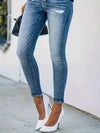Jean skinny taille haute - un denim chic avec détails à boutons