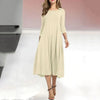 Robe midi femme - ourlet évasé pour un style décontracté - robe casual à manches trois-quarts