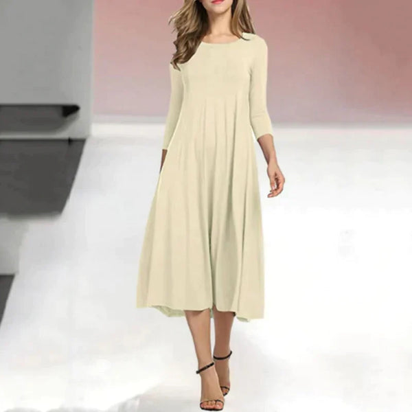 Robe midi femme - ourlet évasé pour un style décontracté - robe casual à manches trois-quarts