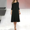 Robe midi femme - ourlet évasé pour un style décontracté - robe casual à manches trois-quarts