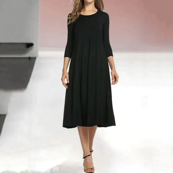 Robe midi femme - ourlet évasé pour un style décontracté - robe casual à manches trois-quarts