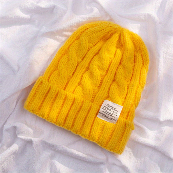 Bonnet tricoté - élégante tuque en maille torsadée pour l'hiver