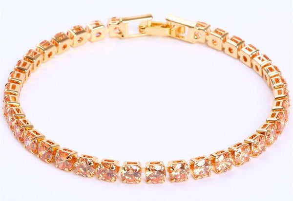 Bracelet de tennis en strass (acrylique) pour femmes - finition argentée et dorée sophistiquée