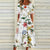 Robe d'été fleurie - robe blanche pour femme avec un motif floral vibrant