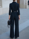 Jumpsuit féminin élégant à jambes larges noir - design ceinturé à double boutonnage pour les dames sophistiquées