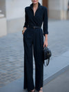 Jumpsuit féminin élégant à jambes larges noir - design ceinturé à double boutonnage pour les dames sophistiquées