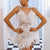 Robe blanche en plumes pour femme - tenue courte élégante ornée de plumes