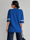 T-shirt oversized style varsity pour femme - coupe décontractée avec des détails sportifs pour un look casual au quotidien