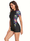 Maillot de bain noir à manches courtes zippé pour femmes - maillot de bain imprimé géométrique pour la piscine et la plage