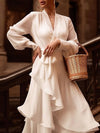 Robe wrap à manches longues - élégance raffinée en blanc