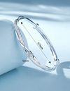 Bracelet jonc en argent torsadé pour femmes - accessory léger et élégant pour le quotidien et les soirées