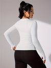 Veste de sport légère pour femmes - t-shirt zippé à manches longues pour une tenue décontractée et sportive