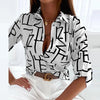 Chemisier féminin chic pour un style smart casual - blouse élégante à motif raffiné