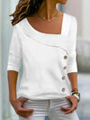 Blouse élégante à manches longues pour femmes, décolleté asymétrique - tenue de bureau chic en blanc avec détails boutonnés