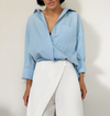Pantalons larges pour femmes - style chic au bureau avec design asymétrique taille haute en blanc classique