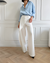 Pantalons larges pour femmes - style chic au bureau avec design asymétrique taille haute en blanc classique