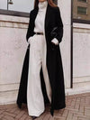 Manteau long noir - élégant avec des poches spacieuses
