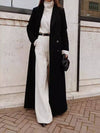 Manteau long noir - élégant avec des poches spacieuses