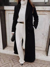 Manteau long noir - élégant avec des poches spacieuses