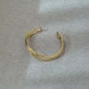 Bracelet jonc en or pour femmes - accessoire chic au style ouvert pour les soirées