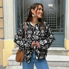 Veste matelassée femme - manteau noir tendance pour un look quotidien - design léger et chic