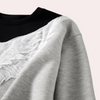 Sweatshirt noir luxe - pull chic pour dames avec détails ailes