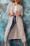 Cardigan long en tricot pour femmes - vêtement d'extérieur et tendance pour un look décontracté