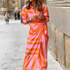 Robe femme - élégante robe portefeuille avec un motif à rayures audacieuses