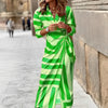 Robe femme - élégante robe portefeuille avec un motif à rayures audacieuses