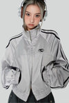 Veste de sport femme chic en gris pour un look décontracté - haut zippé à manches longues