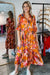 Robe maxi plissée imprimée abstraite - orange vibrant