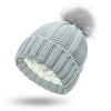 Bonnet tricoté - chapeau d'hiver pour femmes avec pompon en fausse fourrure