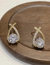 Boucles d'oreilles élégantes en or avec cristaux étincelants