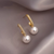 Boucles d'oreilles pendantes en perles - élégantes boucles d'oreilles dorées pour femmes