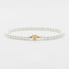 Bracelet en perles - élégant bracelet blanc pour femmes avec charme en cœur