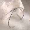 Bracelet manchette en or - design sophistiqué en nœud pour femmes