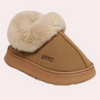 Chaussons en fausse fourrure - des souliers d'intérieur chaleureux pour dames