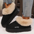 Chaussons en fausse fourrure - des souliers d'intérieur chaleureux pour dames