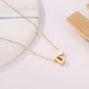 Collier en or avec pendentif cœur et 's' - élégant pendentif pour dames