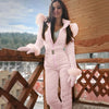 Combinaison d'hiver pour femmes - élégant combi-pantalon rose matelassé