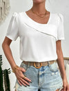 Top asymétrique à manches courtes pour femmes - tendance avec manches bouffantes pour un look décontracté-chic