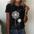 T-shirt femme avec imprimé pissenlit - tee shirt chic à manches courtes pour un style décontracté