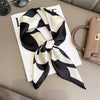 Écharpe en soie - accessoire chic noir et crème pour femmes