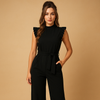 Combinaison femme avec ceinture et manches courtes - tenue chic et polyvalente pour le quotidien ou le soir